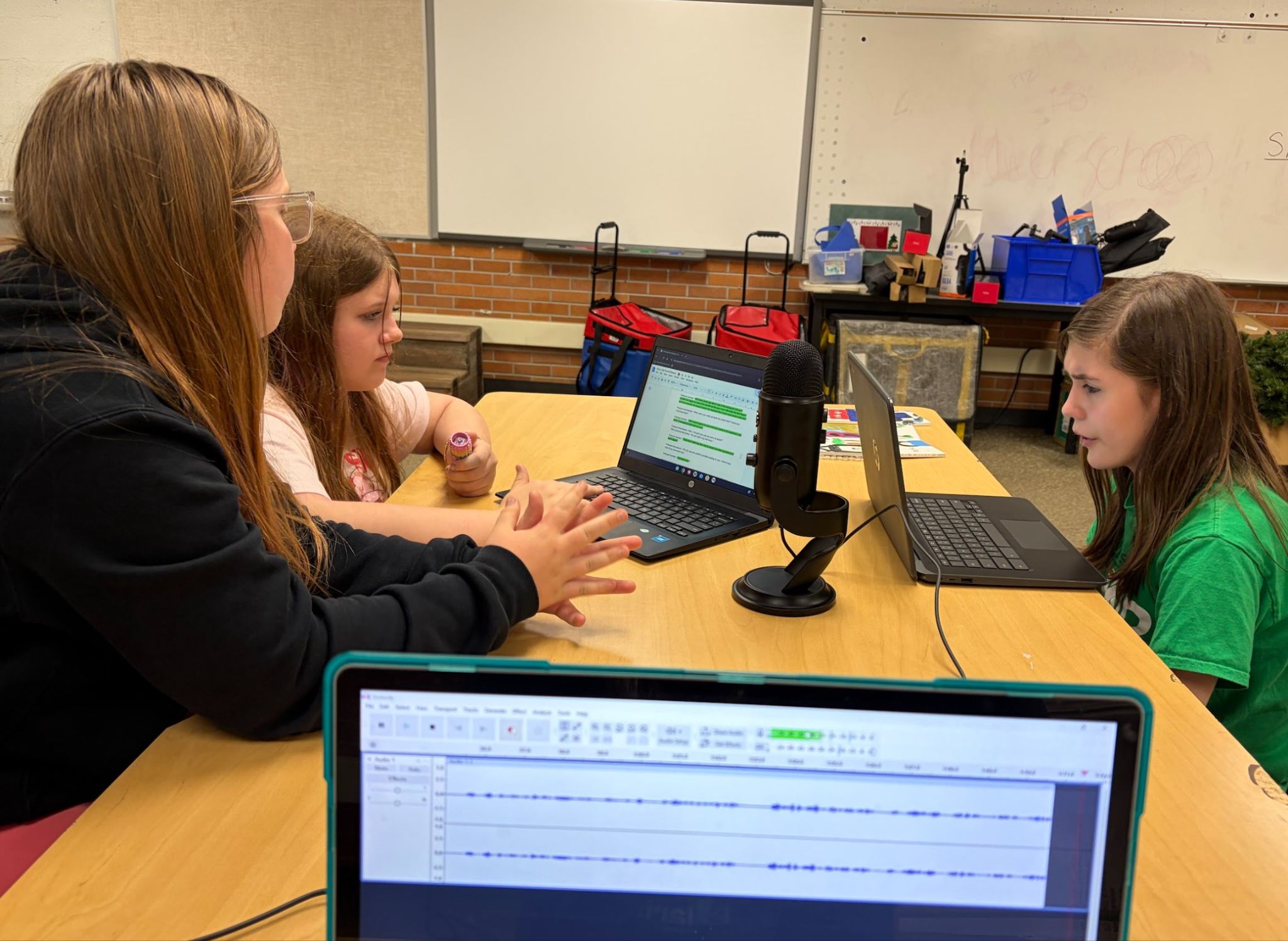 A group of students recording a podcast